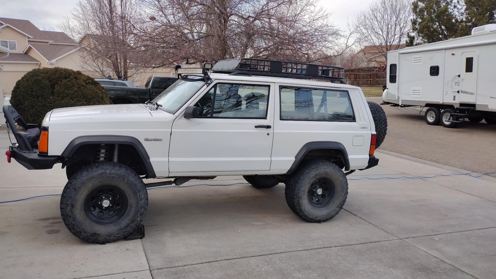 Side profile of jeep with sinking front